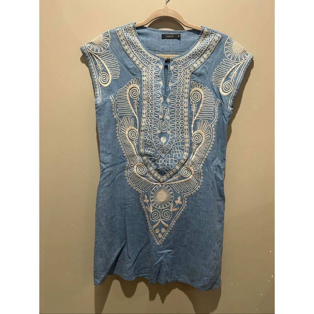 Theme embroidered dress
